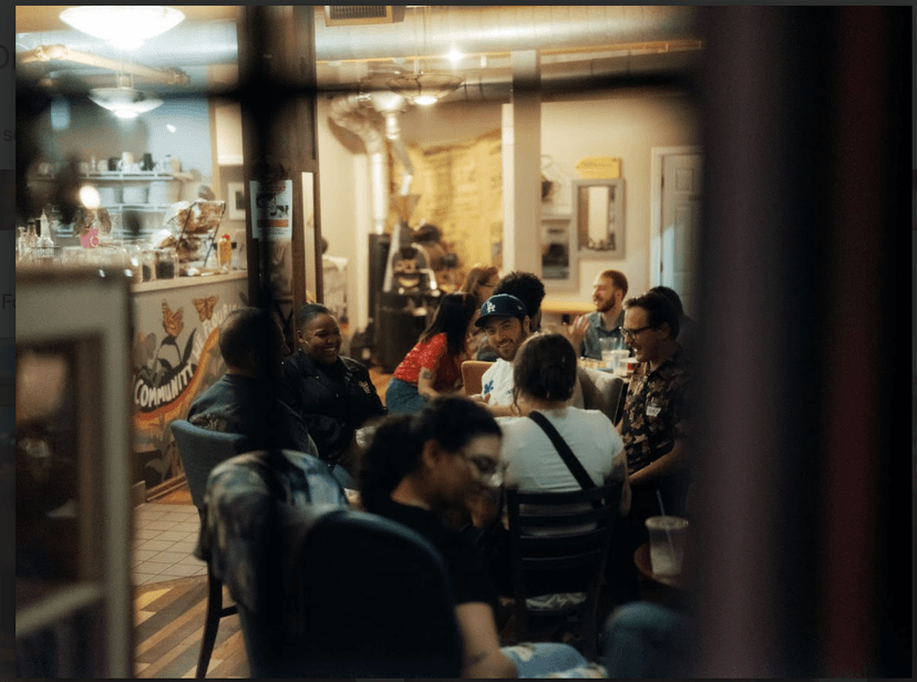 Community members engaging in conversation at a gathering